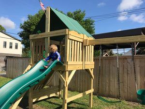 The Explorer Space Saver Swing Set from The SwingSet Co. is great for family time and outdoor play. It is a great small backyard playset with many accessories including an extra large fort, belt swings, trapeze bar, 10’ wave slide, 6’ rock climbing wall and under fort hammock.