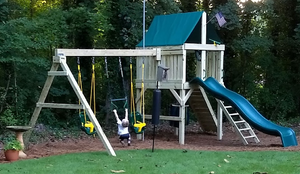 The Explorer Swing Set from The SwingSet Co. . is great for family time and outdoor play. It is a great backyard playset with many activities and accessories including an extra large fort, belt swings, trapeze bar, 10' wave slide, 6’ rock climbing wall and under fort hammock.