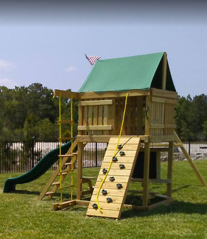 The Summit swing set from The Swingset Co. is great for any size outdoor play area. This playset includes an extra large fort, belt swings, trapeze bar, 10’ wave slide, 6’ rock climbing wall, chalkboard, rope ladder, picnic table and under fort hammock.