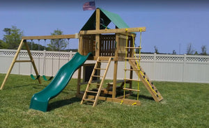 The Premier Swing Set from The SwingSet Co. is great for family time and friends for outdoor play. It is a great backyard playset with many accessories including extra large fort, belt swings, trapeze bar, 10’ wave slide, 6’ rock climbing wall, chalkboard, rope ladder, picnic table and under fort hammock.