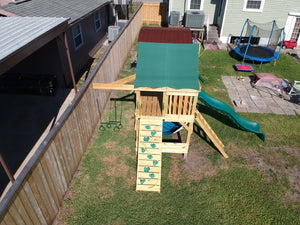 The Explorer Space Saver Swing Set from The SwingSet Co. is great to spend time outside with friends or family and engage in outdoor play. It is a great small backyard playset with many accessories including an extra large fort, belt swings, trapeze bar, 10’ wave slide, 6’ rock climbing wall and under fort hammock.