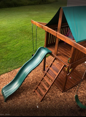 The Pathfinder Swing Set Space Saver Edition from The SwingSet Co. is great for family time and outdoor play. It is a great small backyard playset with many accessories including an extra large fort, a belt swing, trapeze bar, 10' wave slide and an under fort hammock.