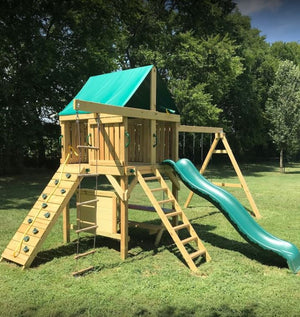 The Summit swing set from The Swingset Co. is great for any size outdoor play area. This playset includes an extra large fort, belt swings, trapeze bar, 10’ wave slide, 6’ rock climbing wall, chalkboard, rope ladder, picnic table and under fort hammock.