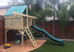 The Pathfinder Swing Set Space Saver Edition from The SwingSet Co. is great for family time and friends for outdoor play. It is a great small backyard playset with many accessories including an extra large fort, a belt swing, trapeze bar, 10' wave slide and an under fort hammock.