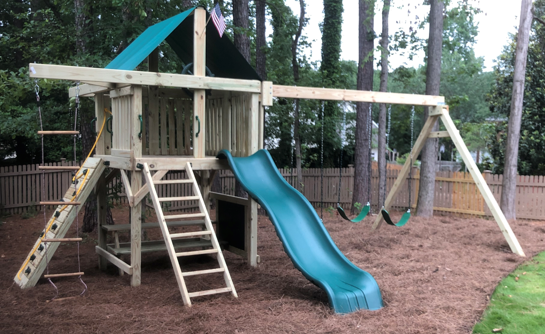 Premier Swing Set with Large Fort, Rock Climbing Wall, Trapeze - The  SwingSet Co.