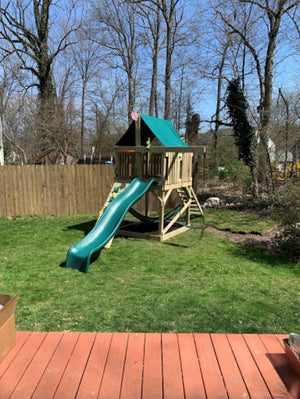 The Pioneer Space Saver Edition Swing Set from The SwingSet Co. is great for family time and friends for outdoor play. It is a great small backyard playset but ample room for activities. There are many accessories for multiple activities including extra large fort, a belt swing, 10' wave slide and an under fort hammock.